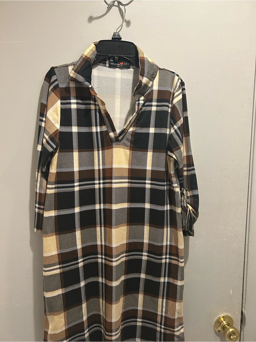 Woman dress black and brown white